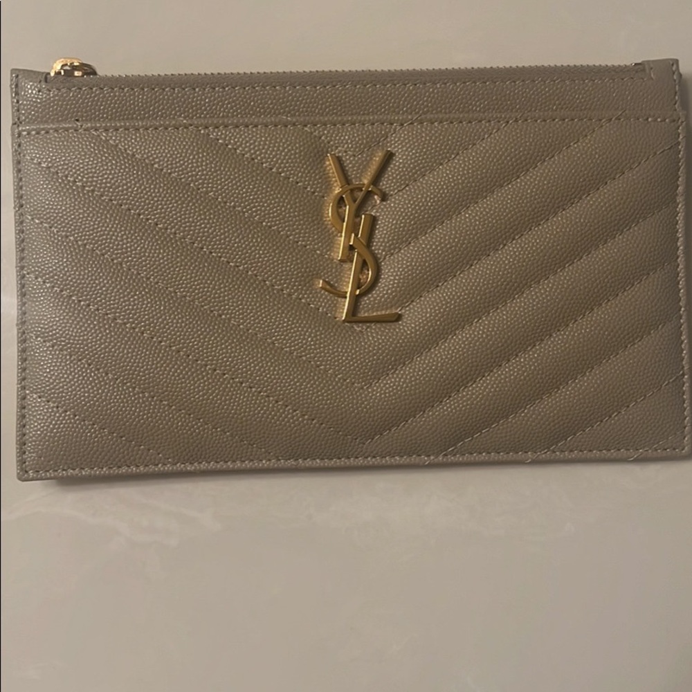 Authentic YSL Saint Laurent Monogram Pouch.